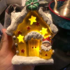 Festive Yellow Santa Holiday House Decoration
